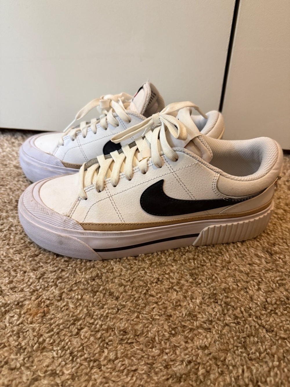 Nike Cream/White Platform Sneakers with Black Swoosh